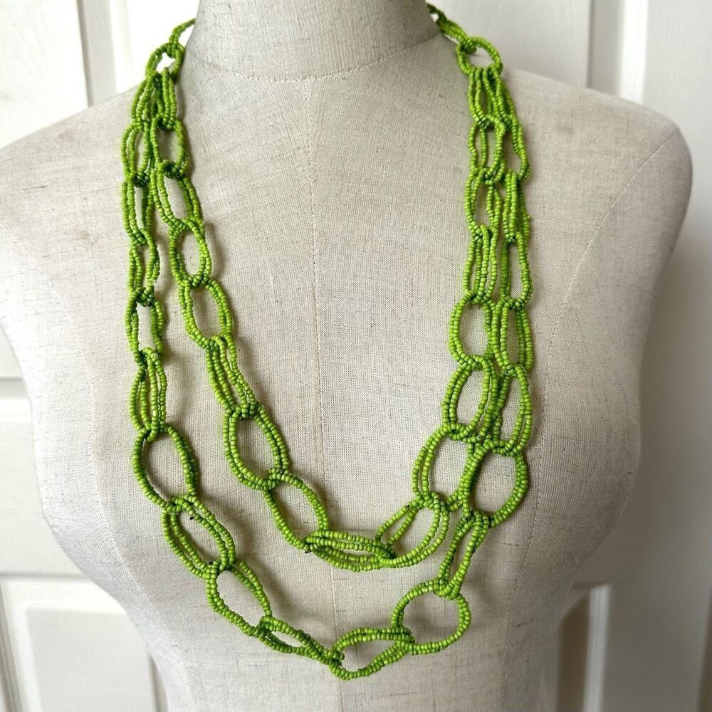 Long green beaded link necklace